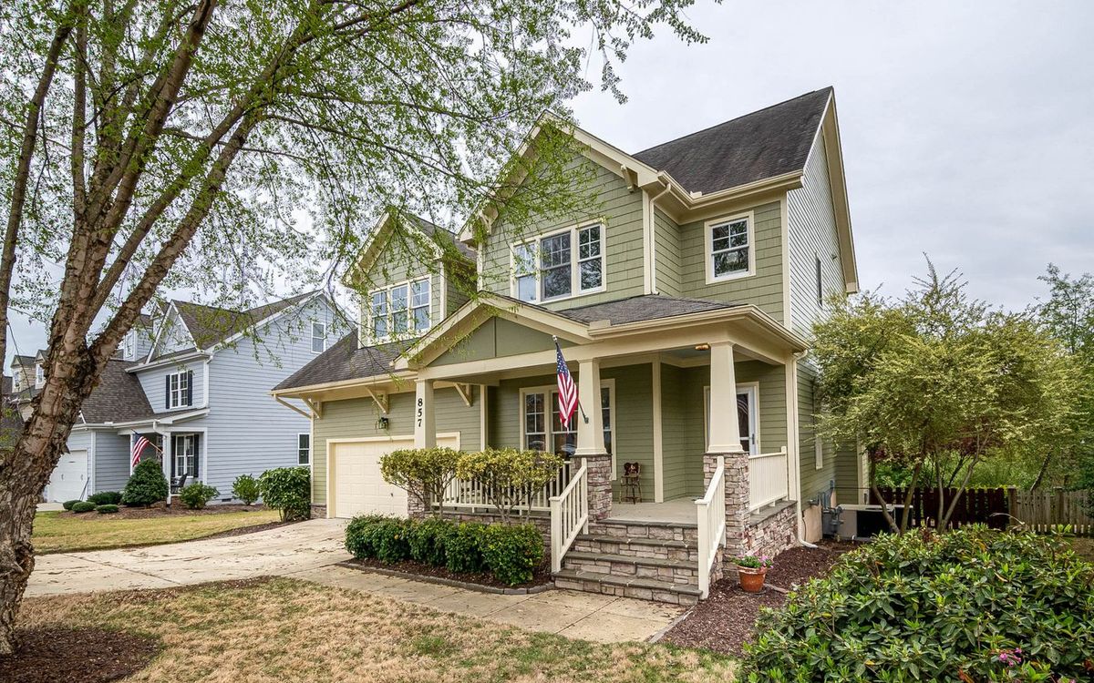 Two-story family home with a covered front porch
