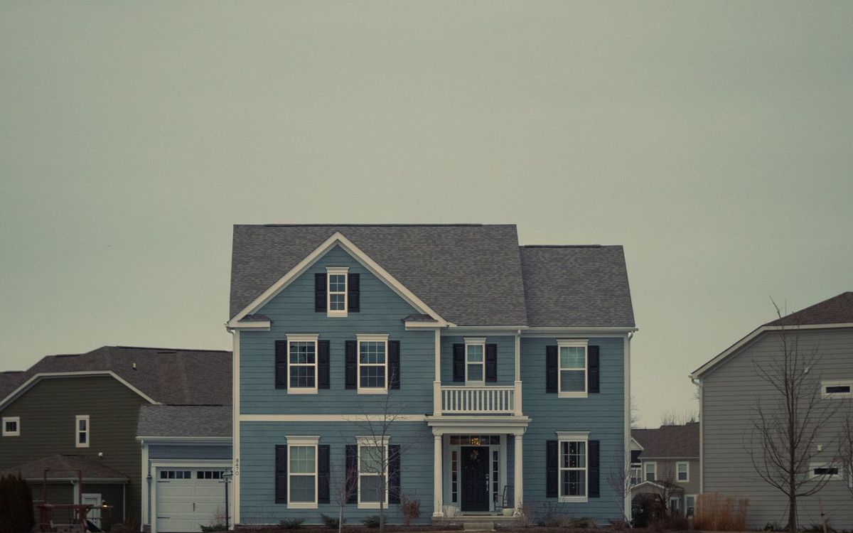 Suburban two-story home on an overcast winter day